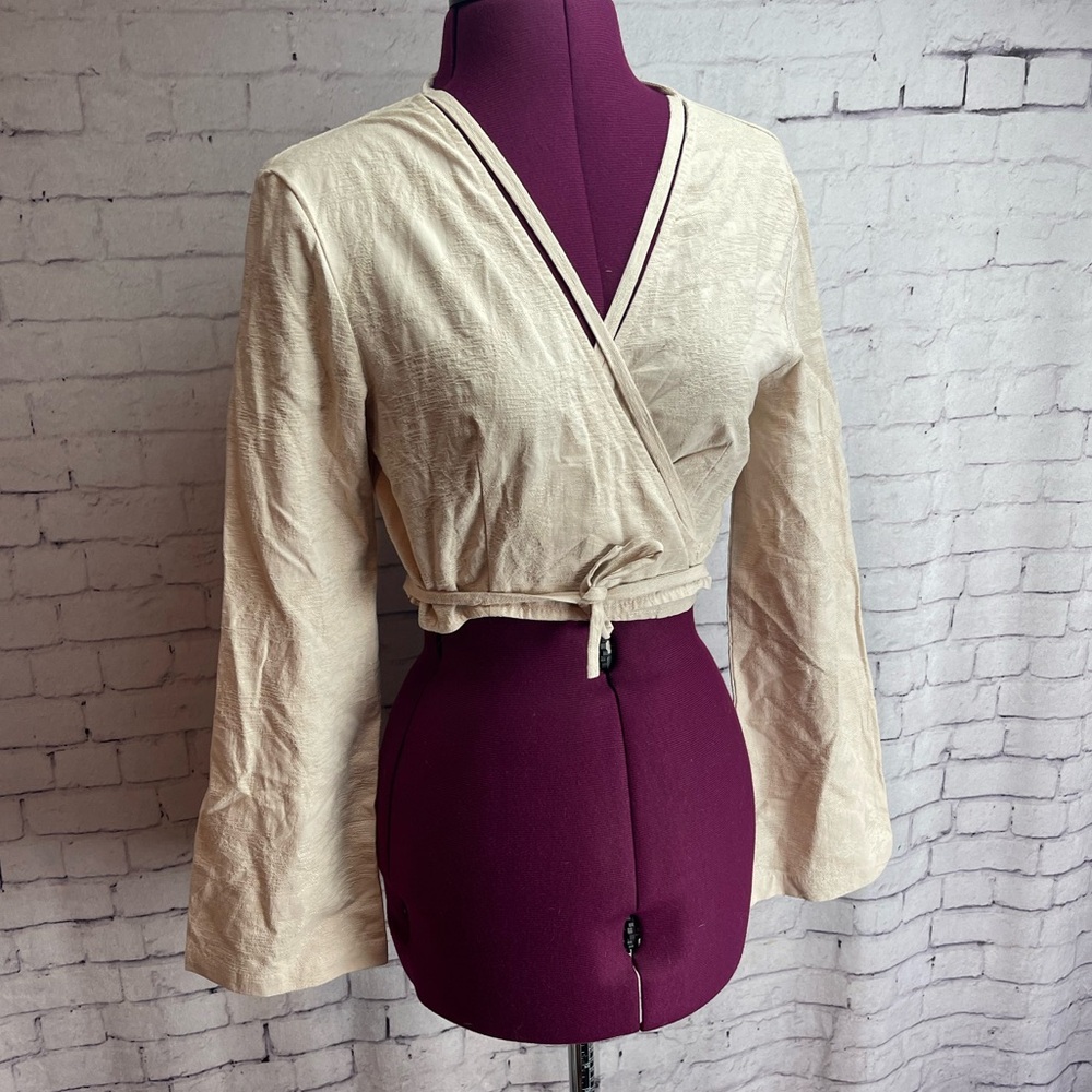Ghospell size small cram colored wrap top